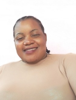 Profil de Léonce, une femme célibataire de 34 ans à Abou