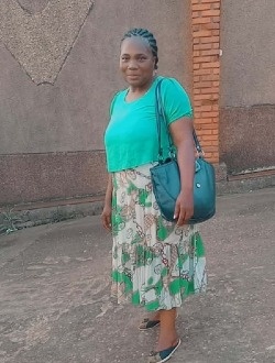 Profil de Béatrice, une femme célibataire de 50 ans à Abam