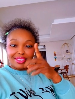 Profil de Divine, une femme célibataire de 40 ans à 'Açaçda