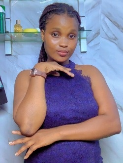 Profil de Bénédicte, une femme célibataire de 28 ans à Cotonou