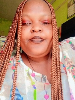 Profil de Djima, une femme célibataire de 43 ans à Abomey