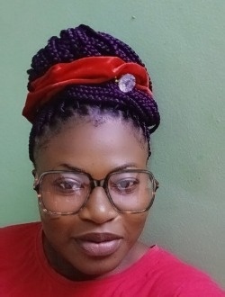 Profil de Amenan Charlotte, une femme célibataire de 30 ans à Abidjan