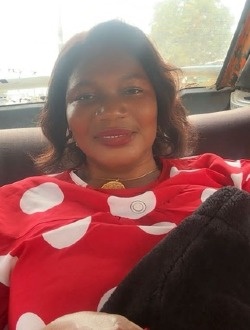 Profil de Marie-Laure, une femme célibataire de 54 ans à Abidjan