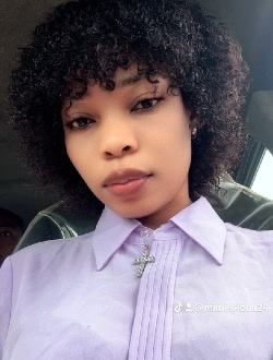 Profil de Marie Claude, une femme célibataire de 34 ans à Abidjan