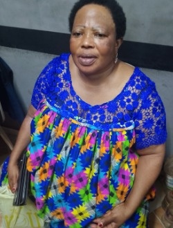 Profil de Justine, une femme célibataire de 48 ans à Akonolinga