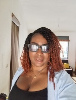 Profil de Sandrine, une femme célibataire de 34 ans à Abidjan