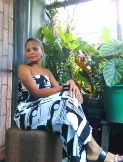 Profil de Thina, une femme célibataire de 34 ans à Toamasina