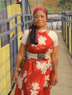 Profil de Marie, une femme célibataire de 46 ans à Genestelle
