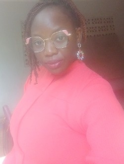 Profil de Régine Valencia, une femme célibataire de 34 ans à Garoua