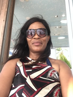 Profil de Jacky, une femme célibataire de 50 ans à Akwaya-Oliti