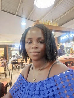 Profil de Brigitte, une femme célibataire de 30 ans à Abidjan