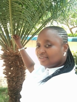Profil de Dora, une femme célibataire de 35 ans à Koudougou